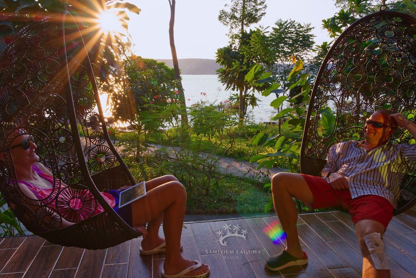 Sunset swings on the beach